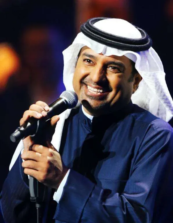 كلمات طمني يا خالد عليك - راشد الماجد
