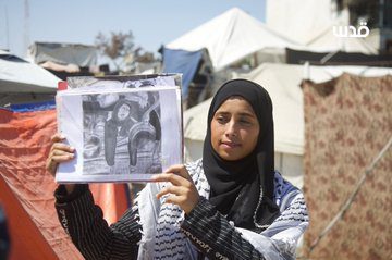 رغدة شيخ العيد فنانة فلسطينية ترسم من رماد الحطب وجع غزة رغدة شيخ العيد